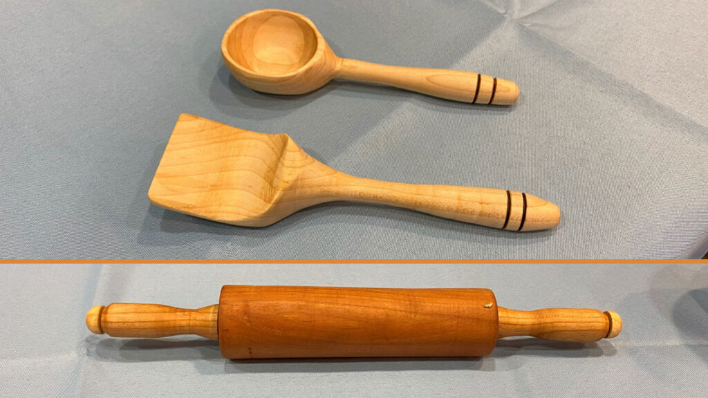 Laura's turned toy treenware: wooden spoon, spatula and rolling pin. The picture is included in the woodturners newsletter.