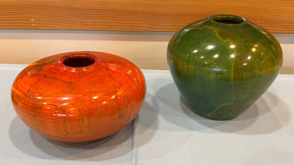 Mark Koenig: two dyed maple bowls: orange and green.