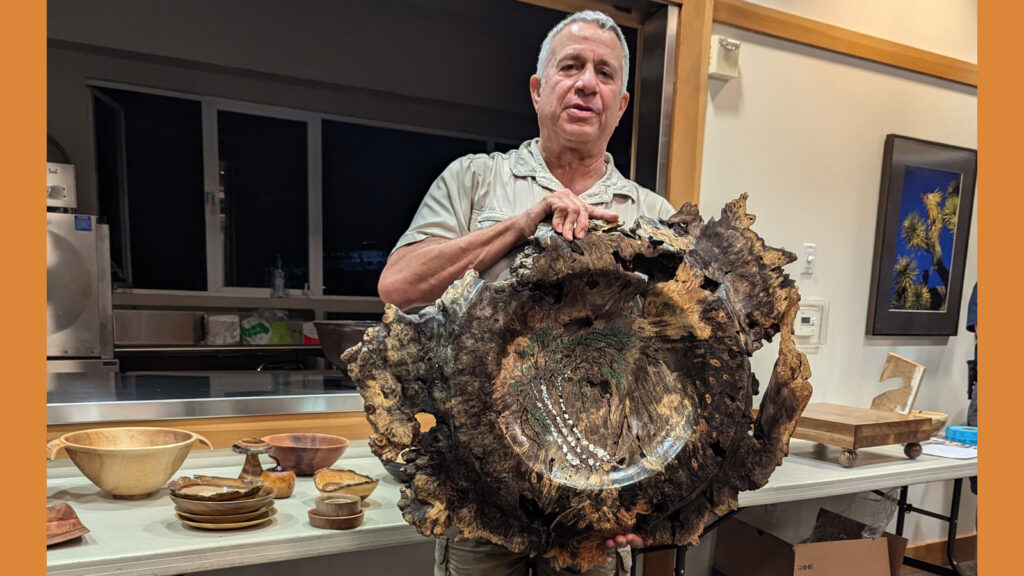 Buckeye burl slab with a birch tree turned by Bob Bley