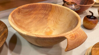 Turned bowl with carved handles by Kelly Smith