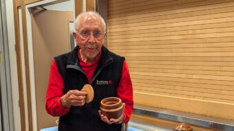 Al Holstein shows a turned lidded box.