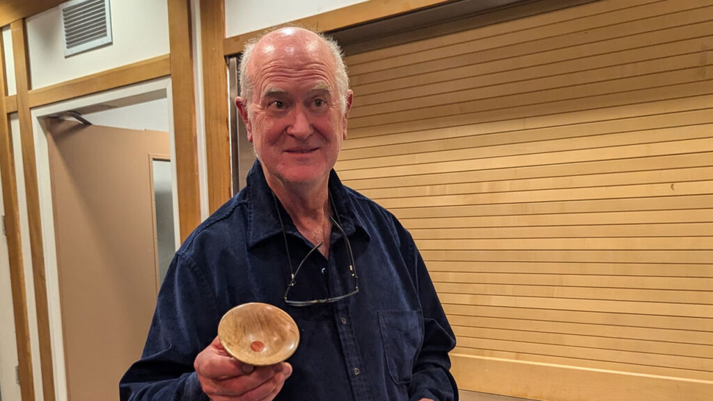 Edgar Whipple shows his small platter