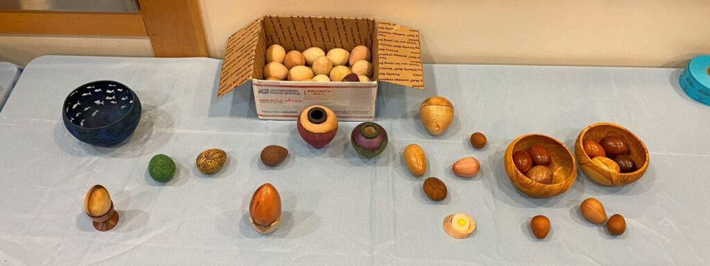 Various egg-shape woodturning projects.