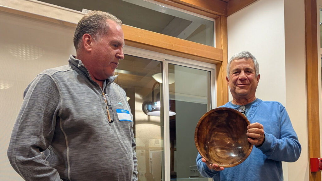 Bob Bley received a black acacia bowl from Dan Boehmke. The bowl was finished with General Finishes bowl finish.