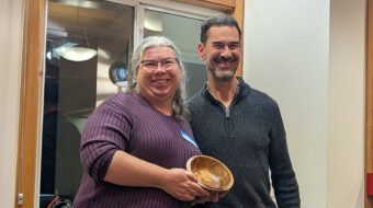 Angela Gunn received a camphor bowl with brass inlay from Chip Krauskopf.