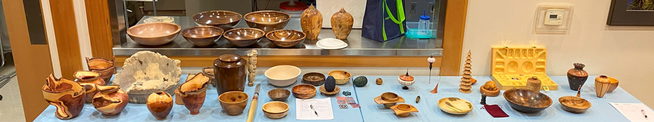 Table with various wood-turning projects for the woodturners newsletter, January 2025