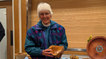 Dottie Bang turned a bowl with natural edge from apricot