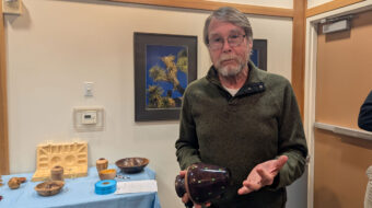 Gordon Peterson turned a segmented vase.