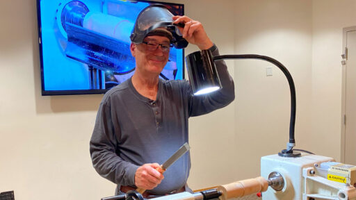 Jon Bishop demonstrates woodturning with a skew.