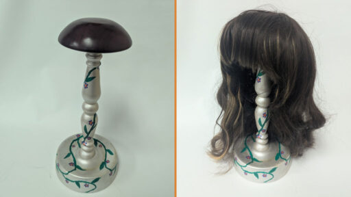 Wig stand by Angela Gunn