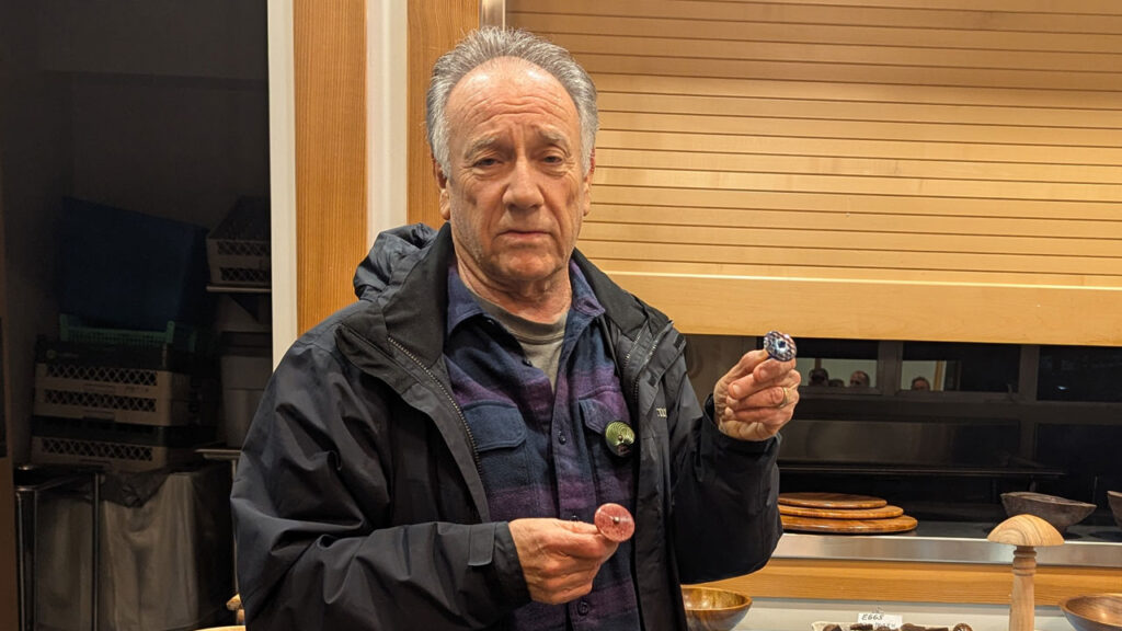 Jon Sauer turned spinning tops