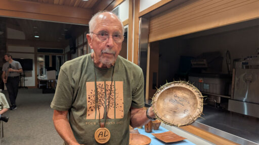 The bowl rim trimmed with a wreath of bougainvillea trimmings
