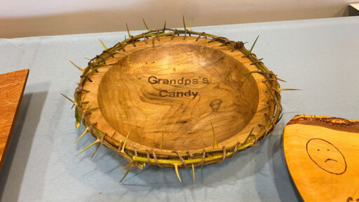 The bowl rim is decorated with sharp horns.