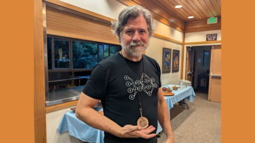 James turned his name badge from a burl.