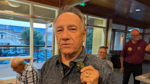 Jon turned his name badge and decorated it with circles.