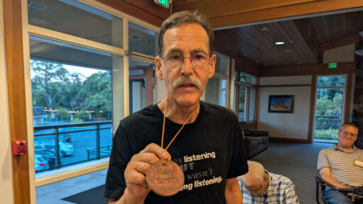 Kelly turned his name badge