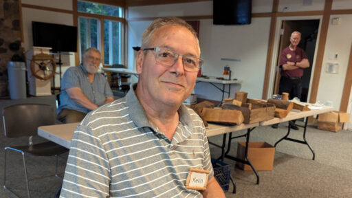 Kevin spindle-turned pieces of wood and assembled them into a name badge frame.