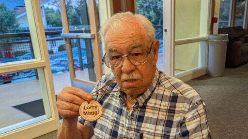 Larry turned his name badge from maple