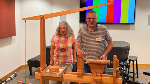 Laura Rhodes and Kevin Lee stay behind a pole lathe