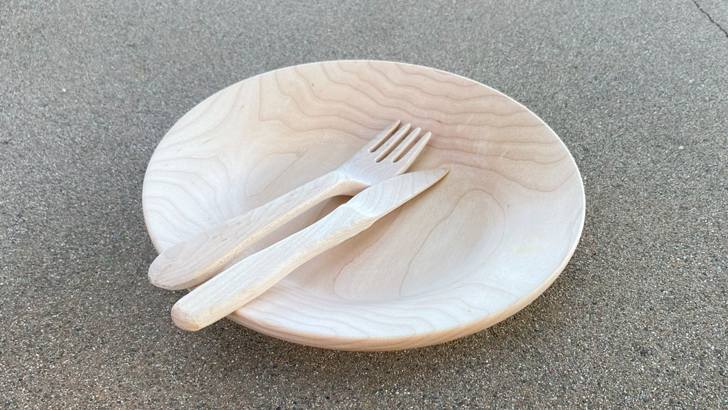 A woodturned platter, carved a fork and a knife from maple. Visit https://readntry.com for more of Roman's projects.