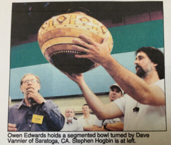 Owen Edwards holds a segmented bowl turned by Dave Vannier of Saratoga, CA. Stephen Hogbin is at left.