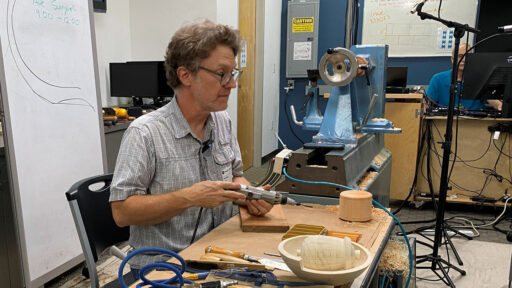 Mark Gardner with a reciprocating carving tool.