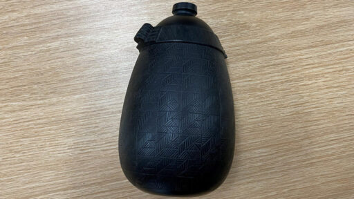 A turned vessel with carved handles and embellished walls with repetitive grooves. Visit Mark's website for more of his work: https://MarkGardnerStudio.com/