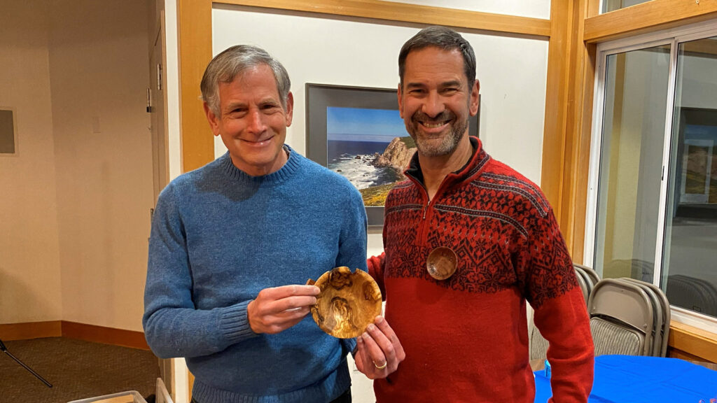 Tom received a turned olive bowl from Chip