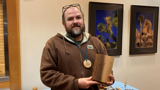 Nate turned a utensil holder with straight walls from a piece of walnut.