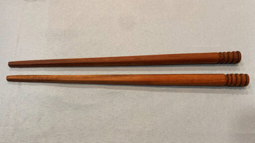 Tom turned and carved chopsticks.