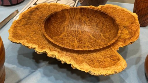 Turned bowl with live edge. Turned from burl by Robert Bley.