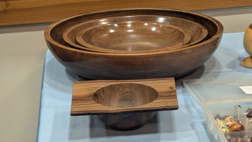 A winged bowl and three cored bowls turned from walnut by Daniel Saal.