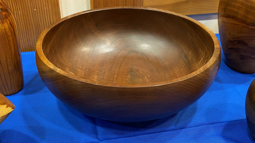 A large walnut bowl that Dan turned on a lathe.