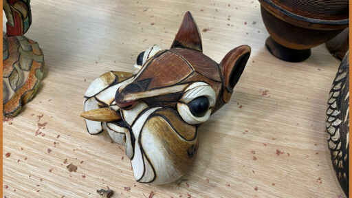 Turned and finished chipmunk with a nut by Derek Weidman.