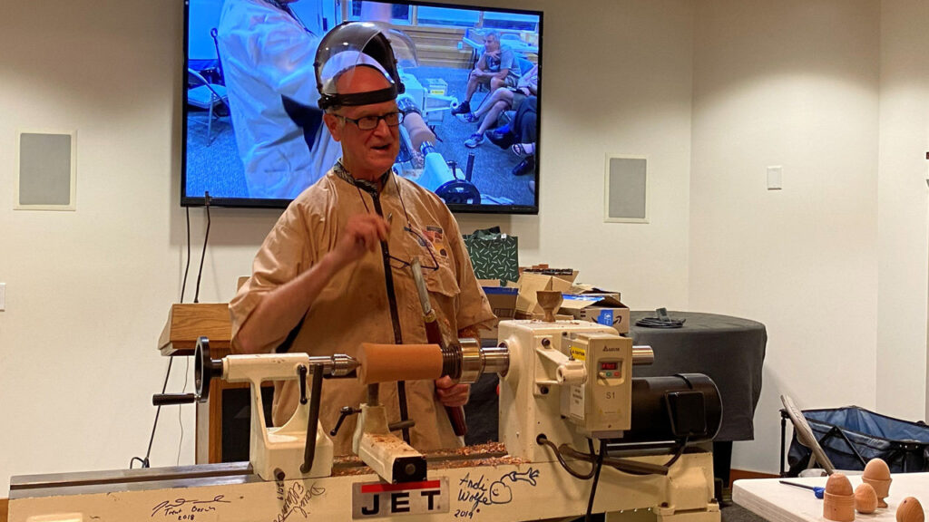 Edgar is turning an egg on a lathe.