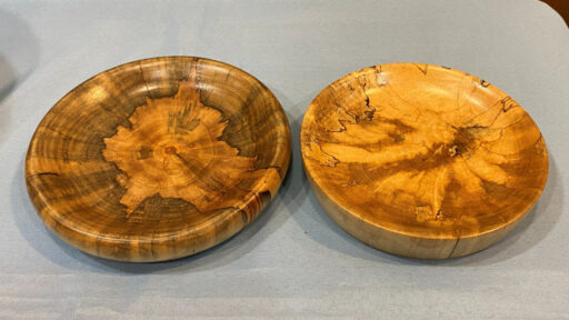 Two shallow bowls that Jon turned on a lathe.