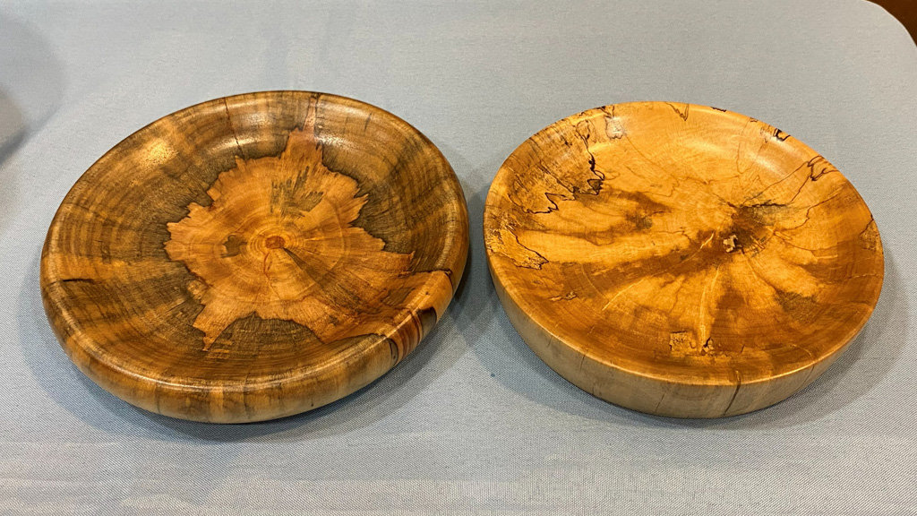 Two shallow bowls that Jon turned on a lathe.