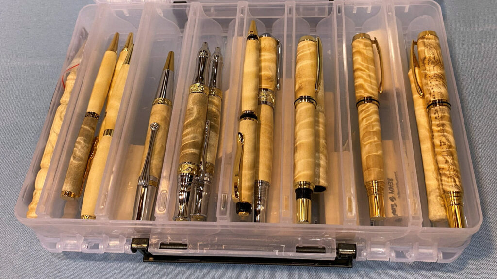 Tina turned a dozen handmade pens from poplar with beautiful grain.