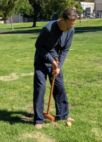 Kelly Smith playing croquet