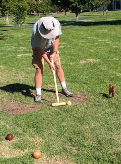 Mark Wedel playing croquet at the August 2026 WBW/SVW annual picnic.