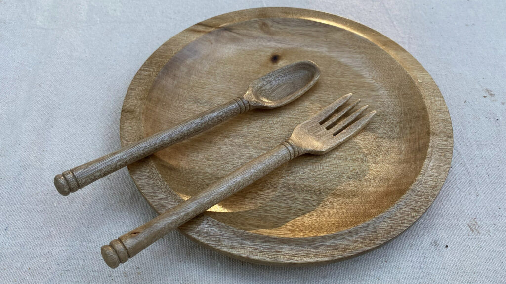 Kevin Lee's turned wooden platter with a matching wooden spoon and fork from Bay Laurel wood.