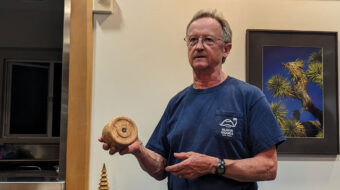 Tom Gaston shows one of his lidded boxes